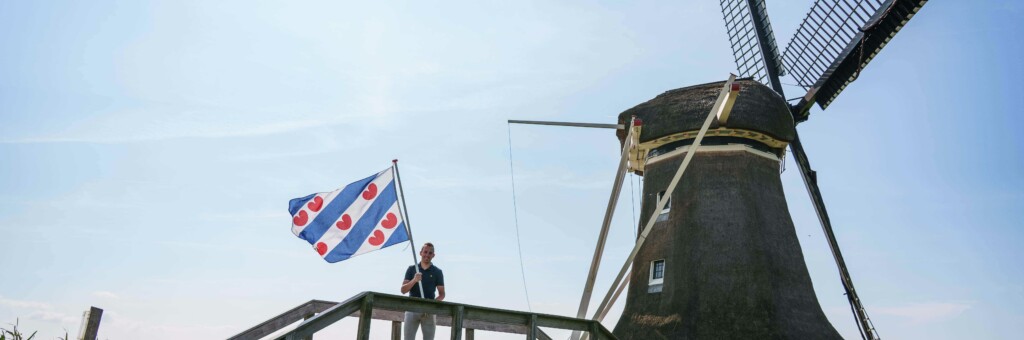 Henk met Friesevlag